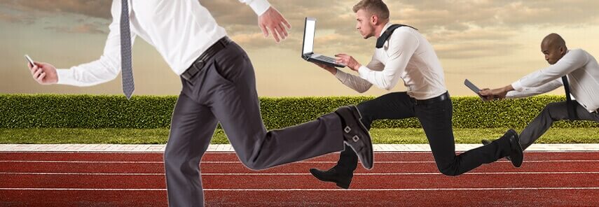 Businessman running on running track